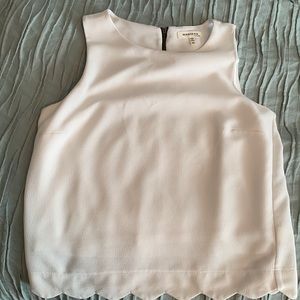 White sleeveless top